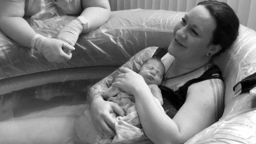 Woman and baby at home birth